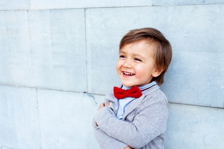 Как ухаживать за молочными зубами - мальчик с открытой улыбкой